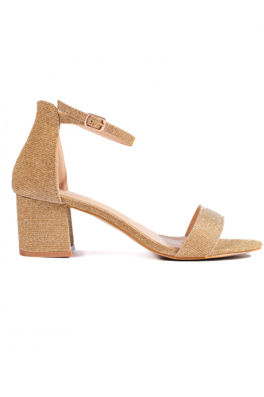 Zelta krāsas kurpes  