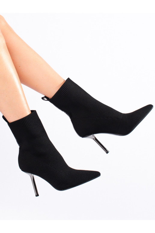 Pieguļoši sieviešu zābaki 