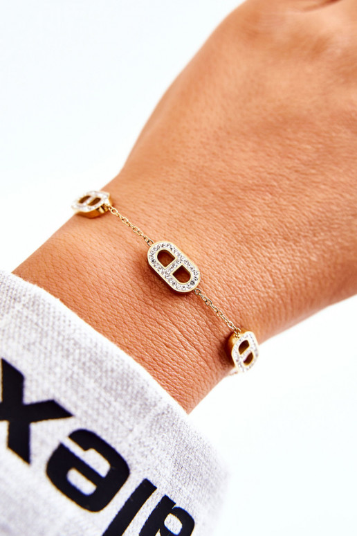 Aproce ar mirdzošiem spīdumiņiem Zelta krāsas