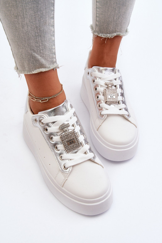 Sneakers modeļa apavi ar ornamentiem baltas krāsas Celedria Sneakers modeļa apavi ar ornamentiem baltas krāsas Celedria