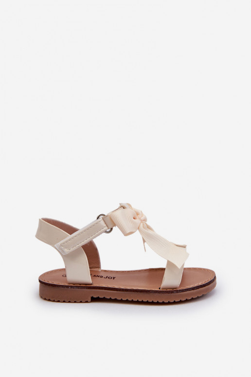 Lakotas sandales Bērnu apavi ar bantītēm ar lipīgām aizdarēm Ziloņkaula krāsas Joratia Lakotas sandales Bērnu apavi ar bantītēm ar lipīgām aizdarēm Ziloņkaula krāsas Joratia