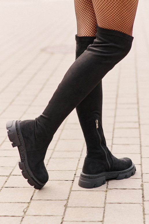 Sieviešu garie zābaki virs ceļgaliem... Sieviešu garie zābaki virs ceļgaliem...