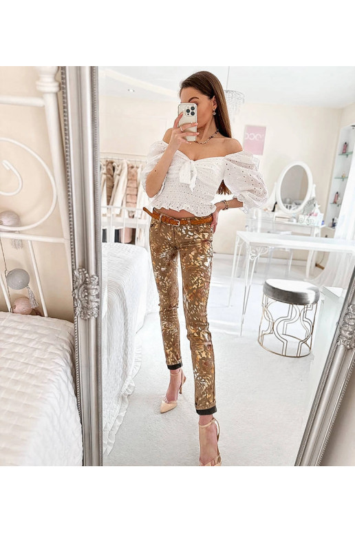 Bēšas bikses ar zelta leoparda...