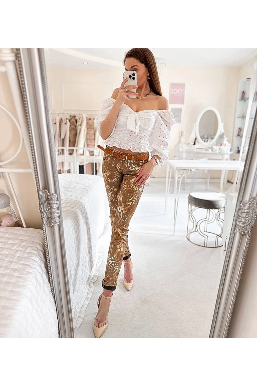 Bēšas bikses ar zelta leoparda...