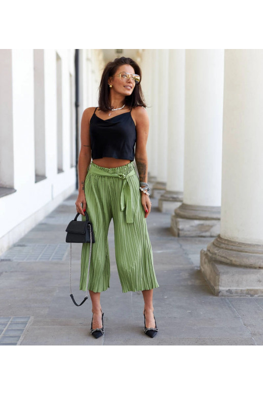 Gaiši zaļas, platas kroku garās bikses