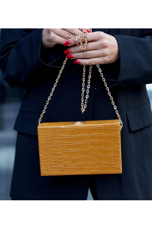 Dzeltena ,,bagāžnieka'' soma uz ķēdes...