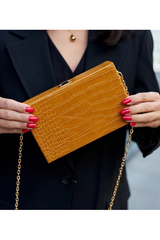 Dzeltena ,,bagāžnieka'' soma uz ķēdes...