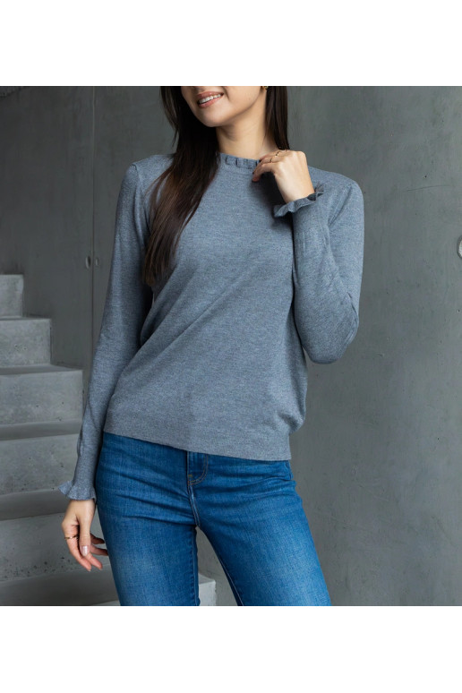 Pelēks mīksts džemperis, dekorēts ar... Pelēks mīksts džemperis, dekorēts ar...