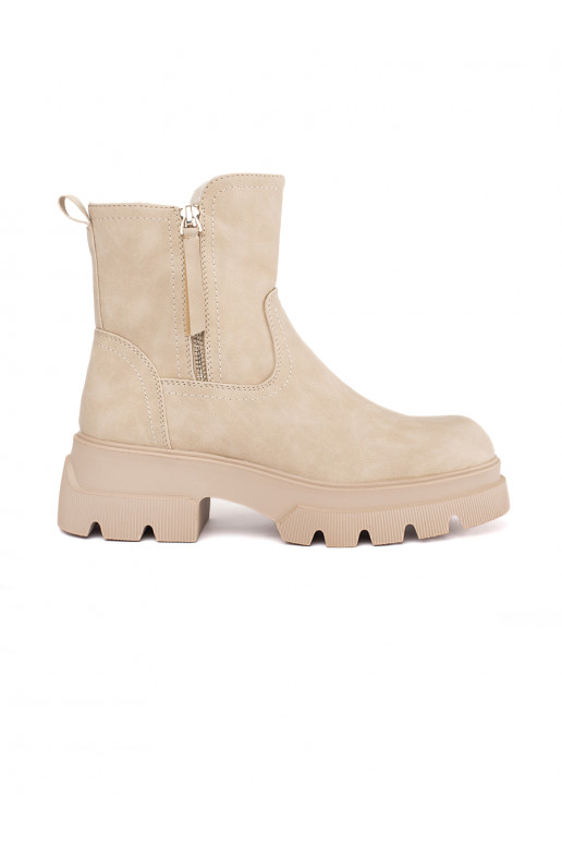 smilšu krāsas sieviešu zābaki izolēts Sergio Leone