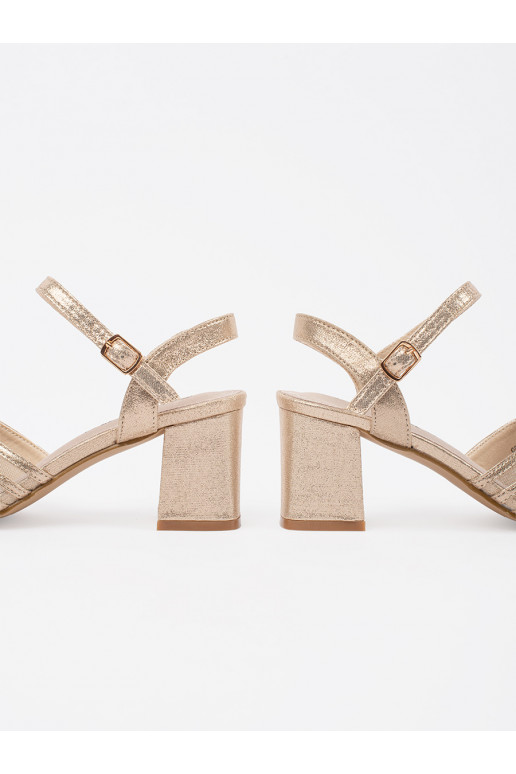 Zelta krāsas  kurpes uz papēža