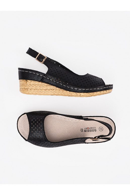 Melns  kurpes  Melns  kurpes