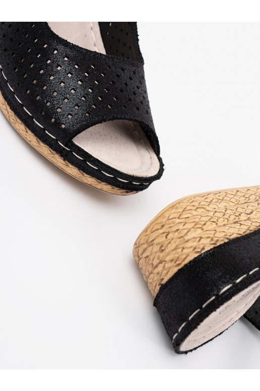 Melns  kurpes  Melns  kurpes