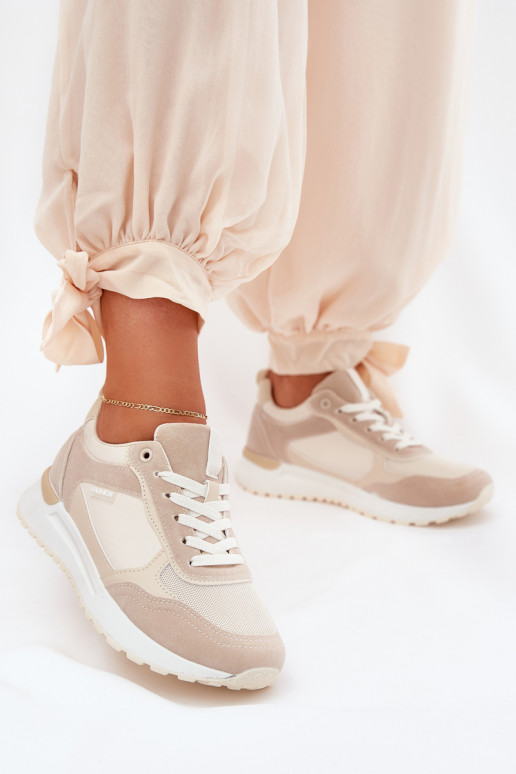 Sieviešu sporta apavi smilšu krāsā