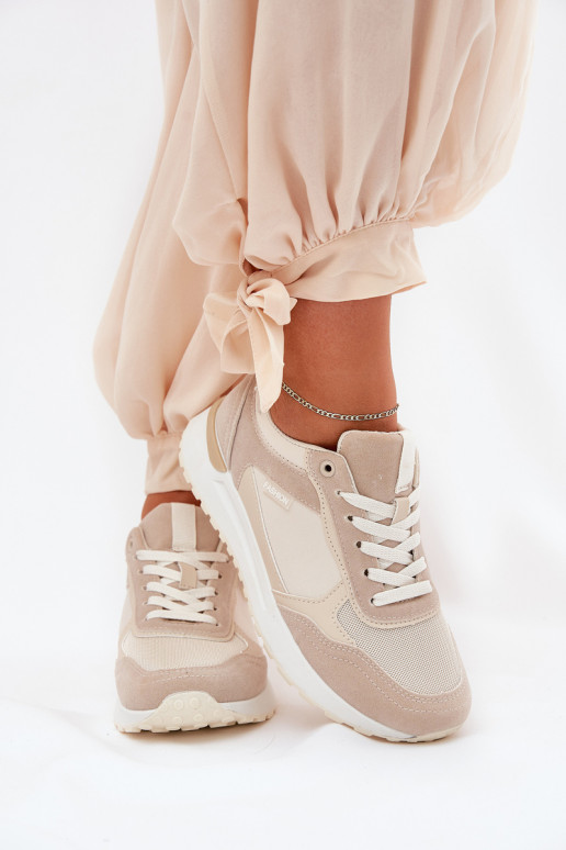 Sieviešu sporta apavi smilšu krāsā