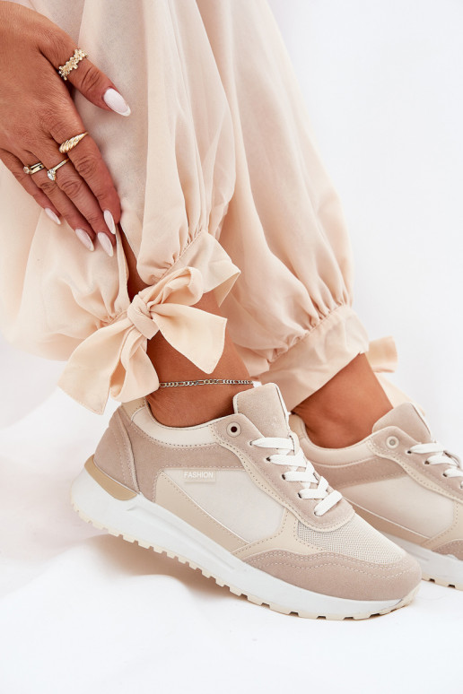 Sieviešu sporta apavi smilšu krāsā