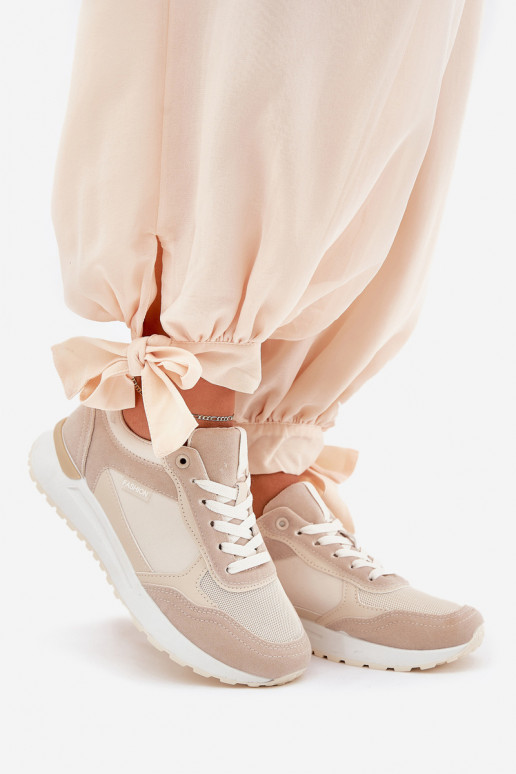 Sieviešu sporta apavi smilšu krāsā