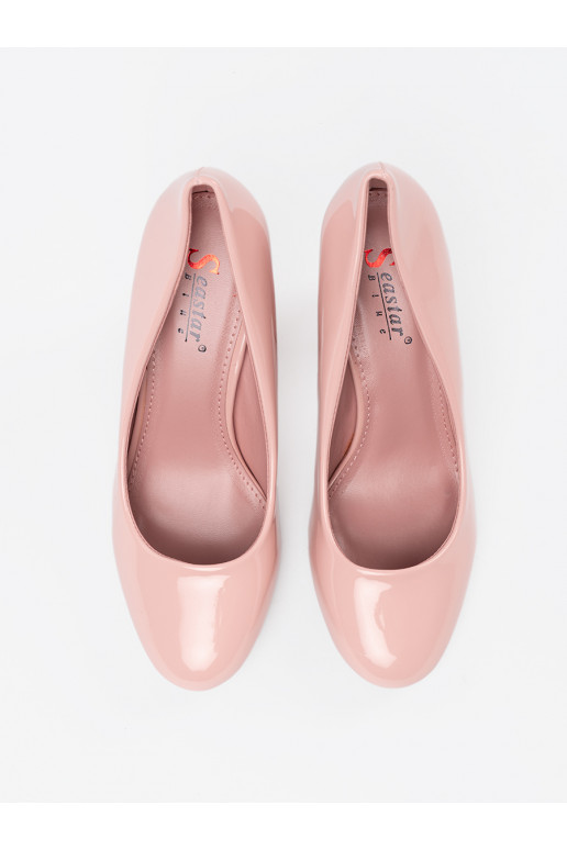 Rózowe  puszābaki uz papēža