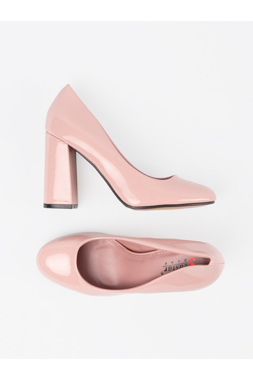 Rózowe  puszābaki uz papēža