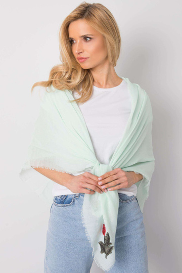 Zaļš pleds ar ziedu svītrām