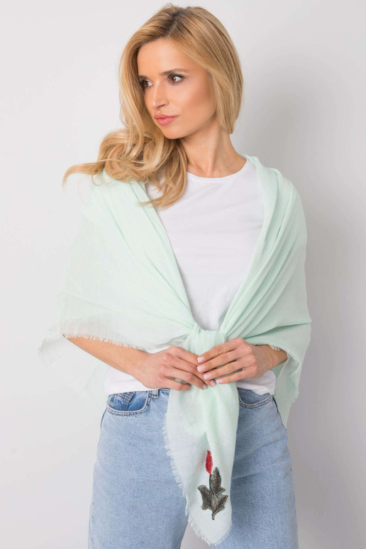 Zaļš pleds ar ziedu svītrām