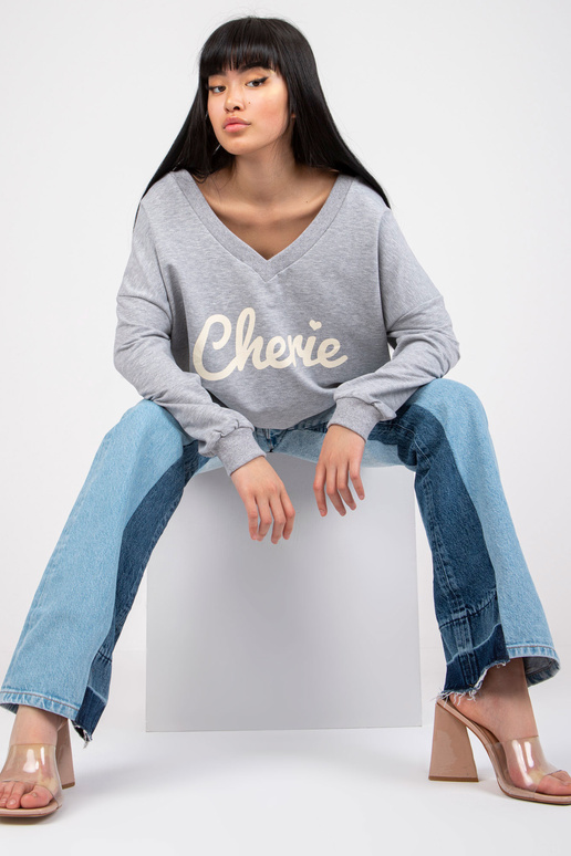 Pelēka melanža apdrukas džemperis ar... Pelēka melanža apdrukas džemperis ar...