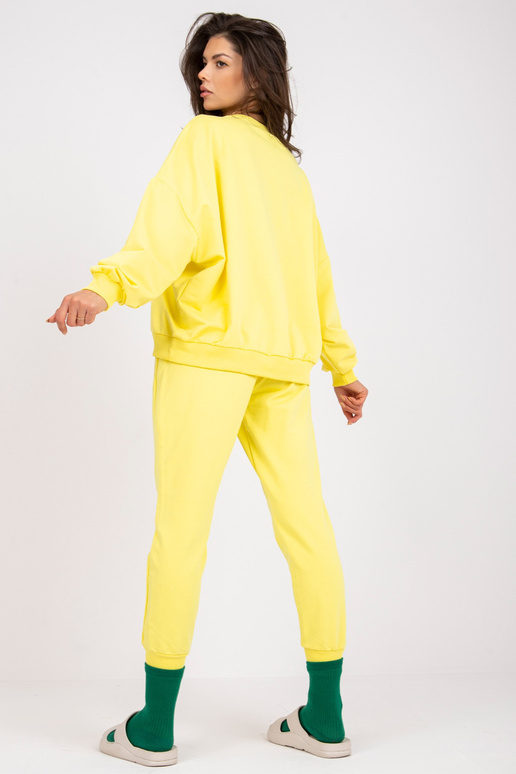 Dzeltens divdaļīgs sporta tērpa...
