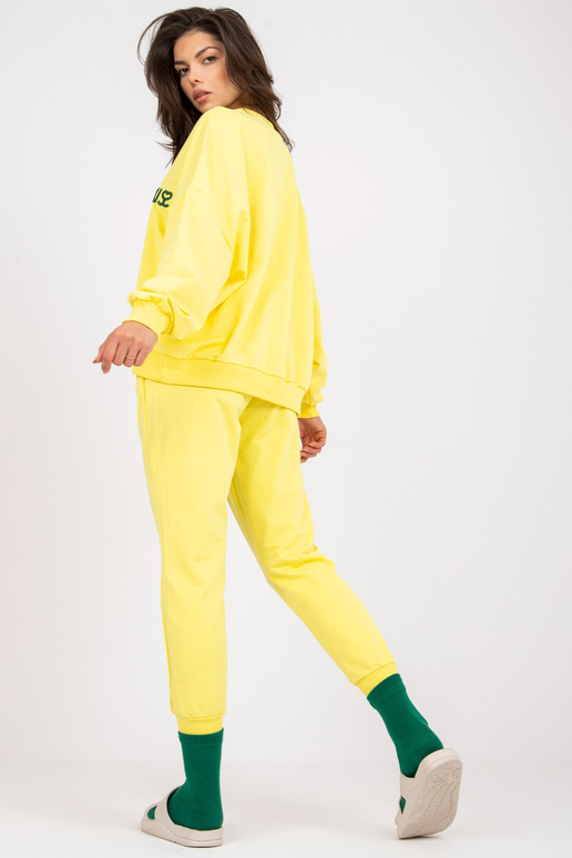 Dzeltens divdaļīgs sporta tērpa...