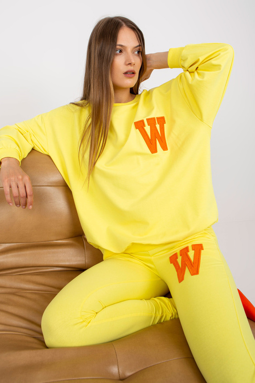 Dzeltens divdaļīgs sporta kreklu...