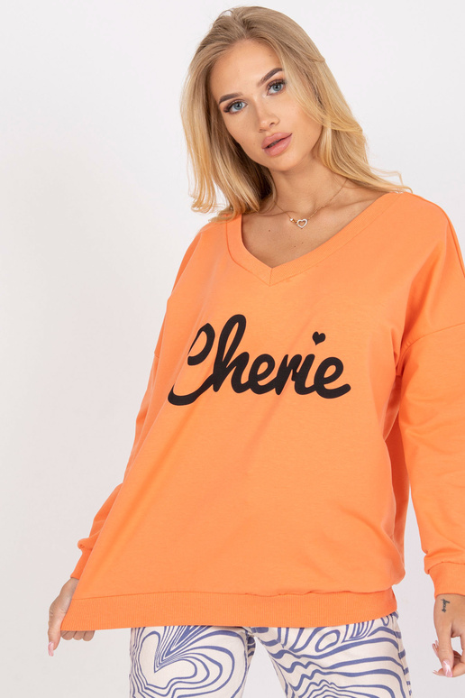 Džemperis ar oranži melnu apdruku ar... Džemperis ar oranži melnu apdruku ar...