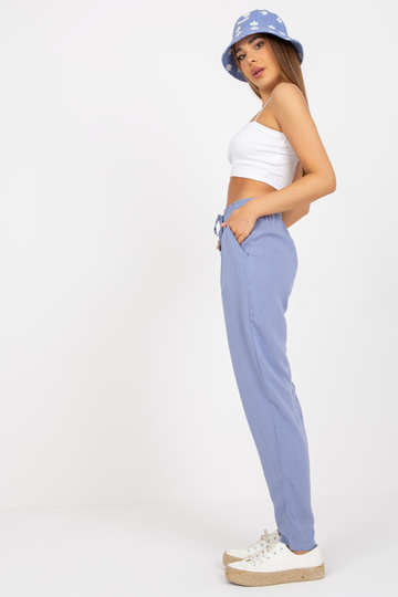 Gaiši zilas auduma bikses...