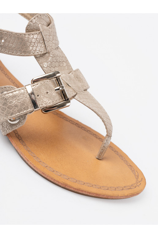 Ziloņkaula krāsas kurpes z motywem wężowym