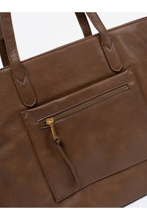 Brūnas krāsas Soma ze mi elementami