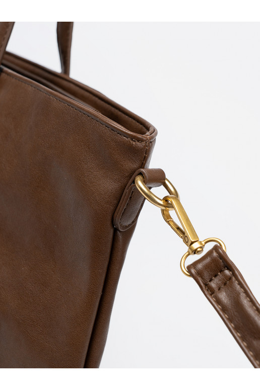 Brūnas krāsas Soma ze mi elementami