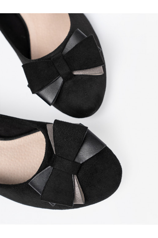 Melns puszābaki  uz papēža Melns puszābaki  uz papēža