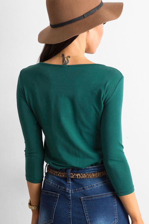 Tumši zaļa pamata blūze no Mona...