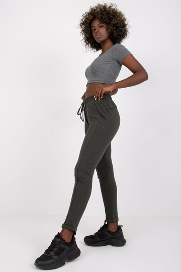 Tumšas haki krāsas bikses... 2