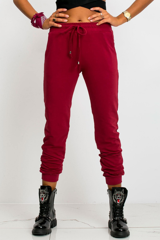 Tumši sarkanas bikses Ātrāk