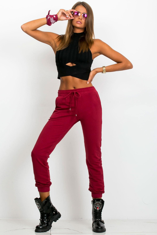 Tumši sarkanas bikses Ātrāk