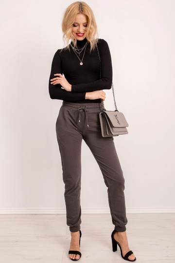 Tumšas haki krāsas bikses...