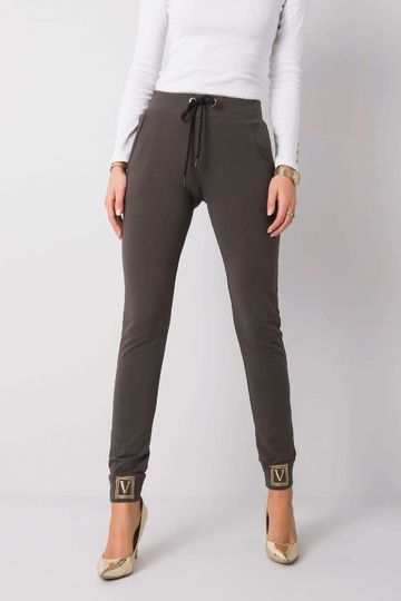 Tumšas haki krāsas bikses...