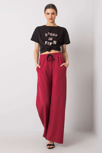 Burgundijas sporta bikses... 2