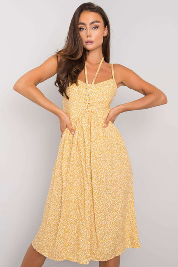 Dzeltena kleita ar rakstiem...