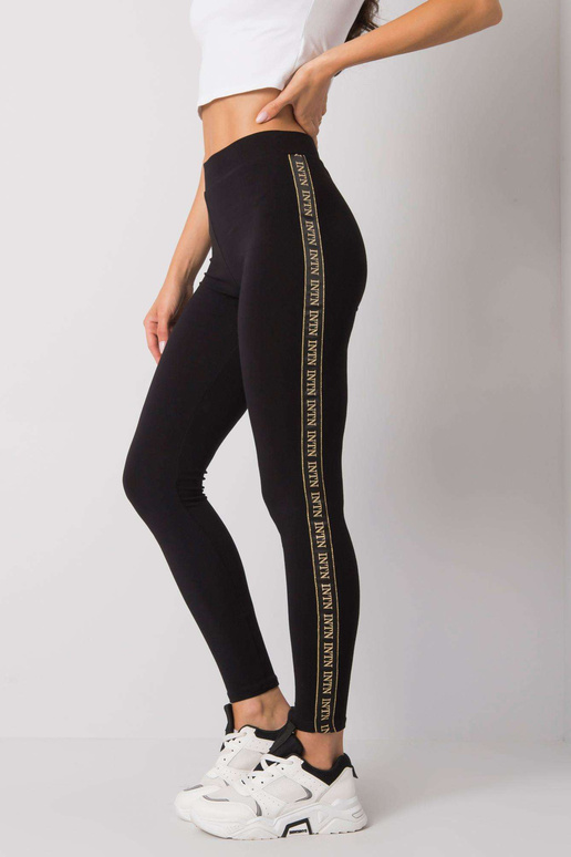 Melni un zelta legingi ar svītrām...