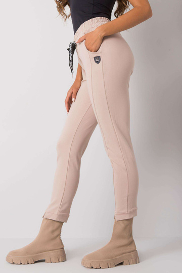 Bēšas treniņbikses ar...