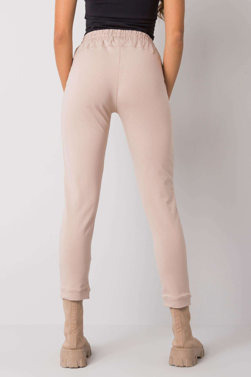 Bēšas treniņbikses ar Peyton uzrakstiem