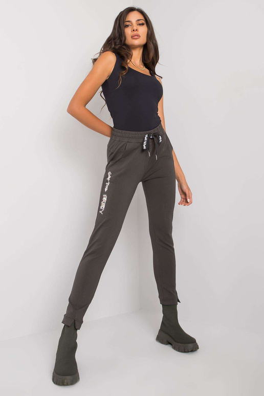 Tumšas haki krāsas treniņbikses ar... Tumšas haki krāsas treniņbikses ar...