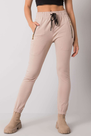 Gaiši bēšas treniņbikses ar...