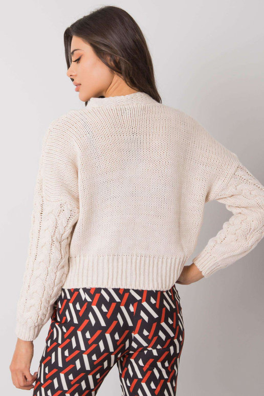 Bēšs džemperis ar pogām ar bizēm...