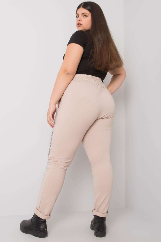 Bēšas plus izmēra treniņbikses ar...