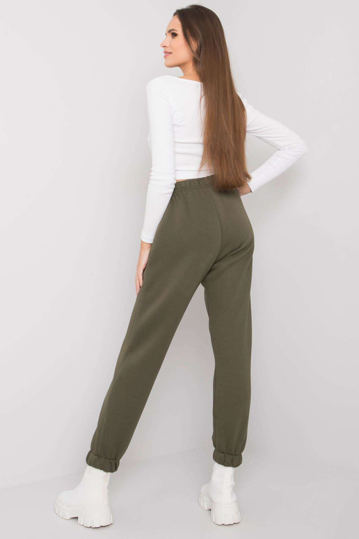 Caurspīdīgas haki krāsas treniņbikses...